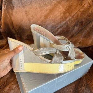 Size 40.5 silver Prada wedge sandals.